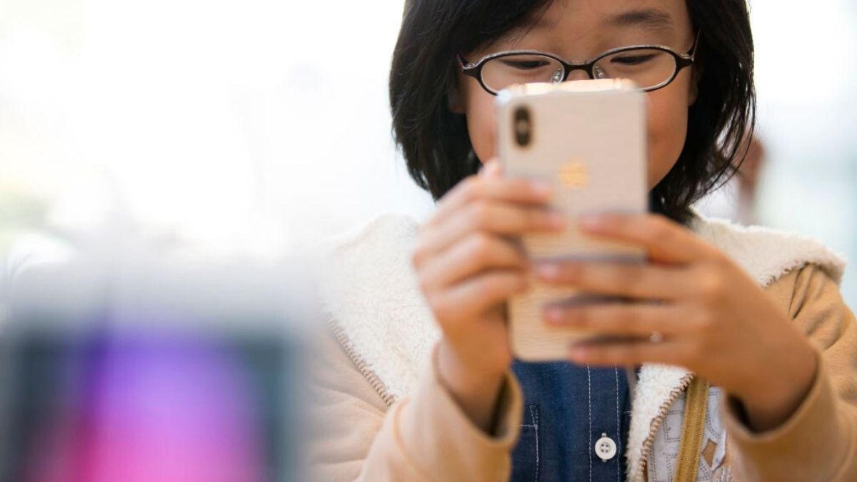 97% dos pais chineses dão celulares aos filhos - reprodução/ Getty Images