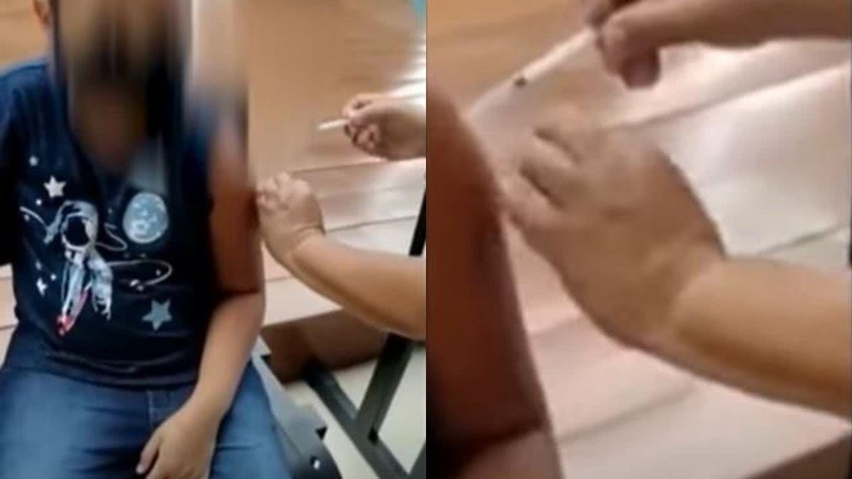 A enfermeira fura o menino mas não aplica o imunizante - Reprodução/YouTube