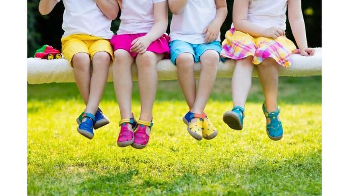 kids-with-colorful-shoes-children-footwear-picture-id859156946