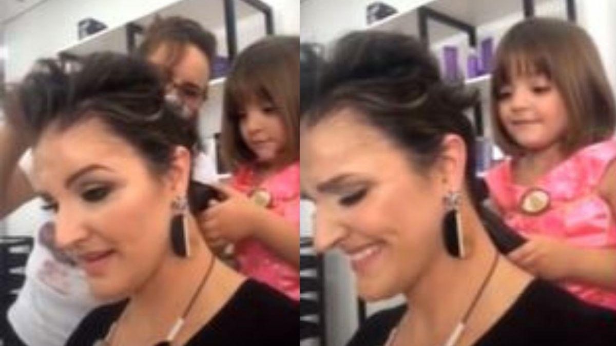 Valentina ajudando a mãe a raspar o cabelo - Reprodução/G1