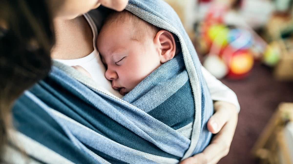 A mulher apareceu com um bebê em casa - Getty Images
