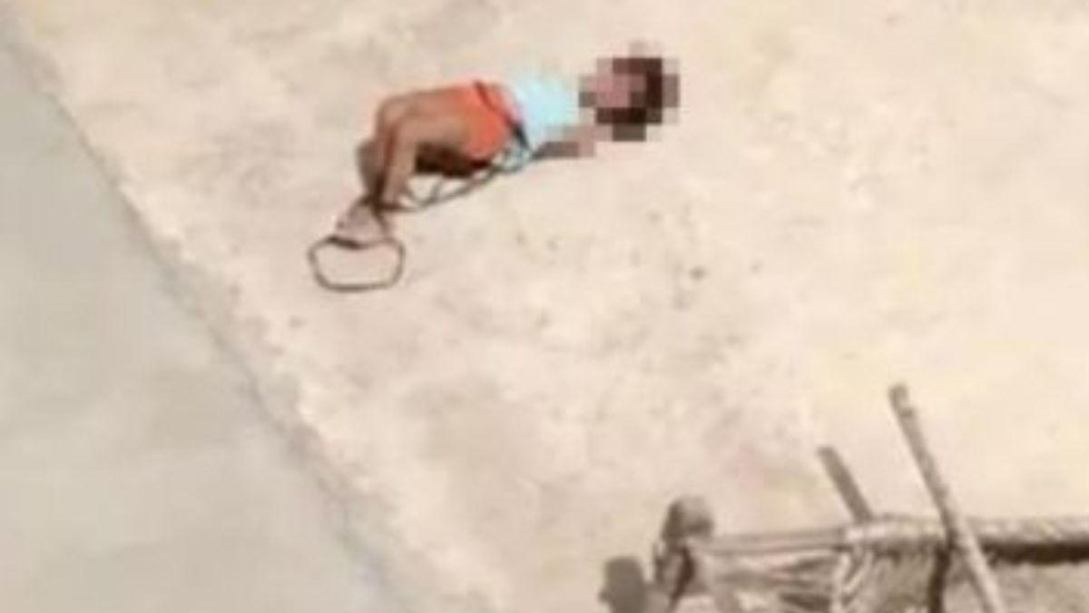 Menina indiana é gravada se contorcendo em telhado - Reprodução NDTV 