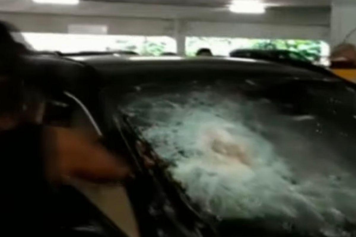 Polícia estourou vidro da BMW com uma picareta 
