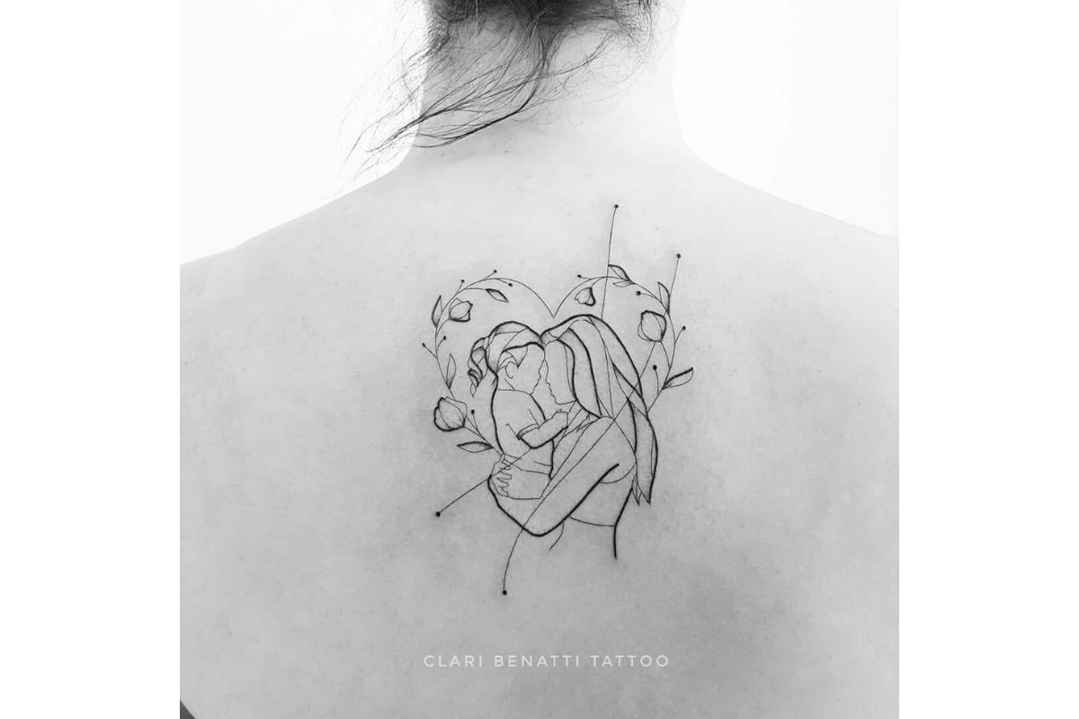 Tatuagem para filha com flores e coração