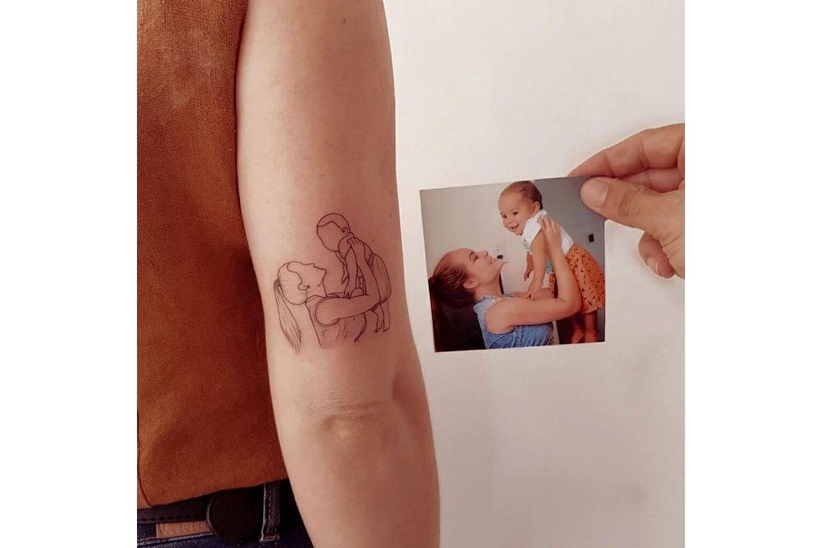 Tatuagem para filho inspirada em fotografia 