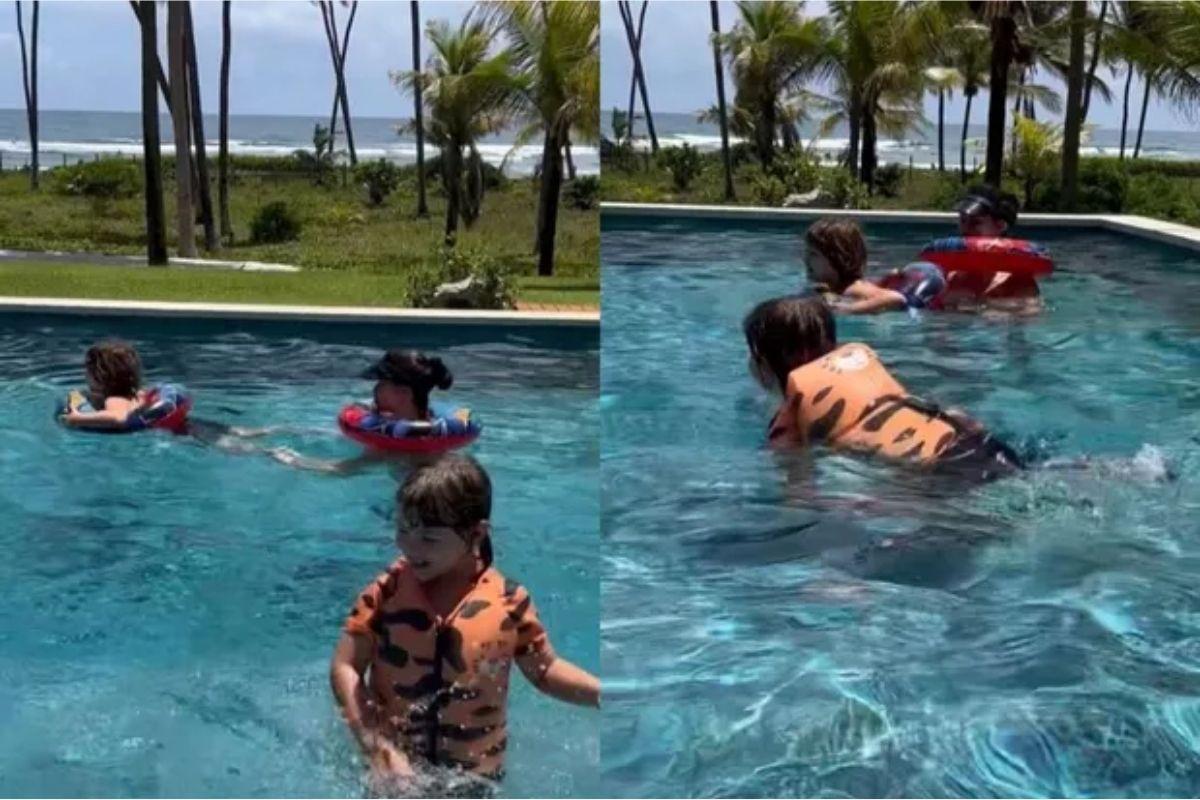 Andressa Suita curte piscina com os filhos